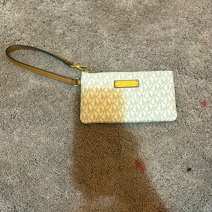 Tan Micheal Kors wallet with wristlet